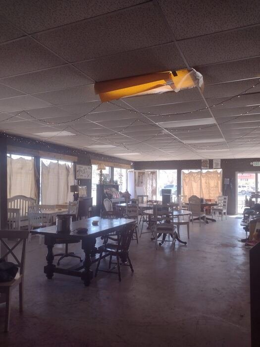 Daytime interior seating area at Black Sheep Coffee