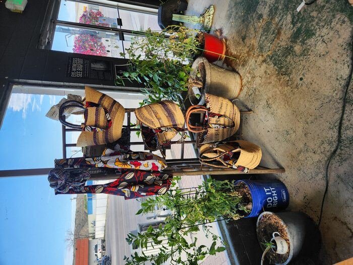 Locally made goods for sale, with an Eye-Witnesses See Bigfoot clipping on the wall